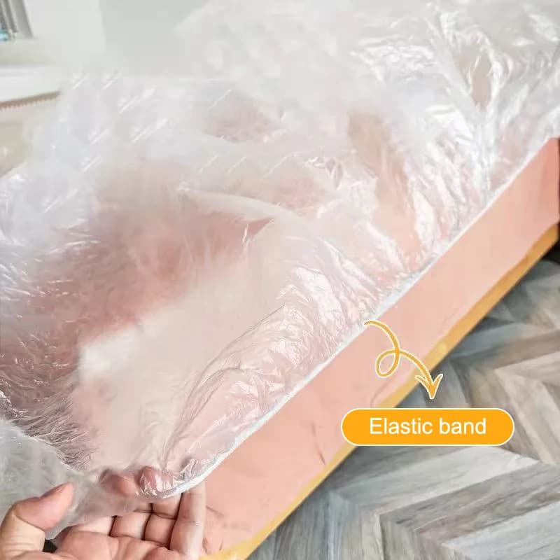 Elastic plastic furniture dust cover on a sofa, in use
