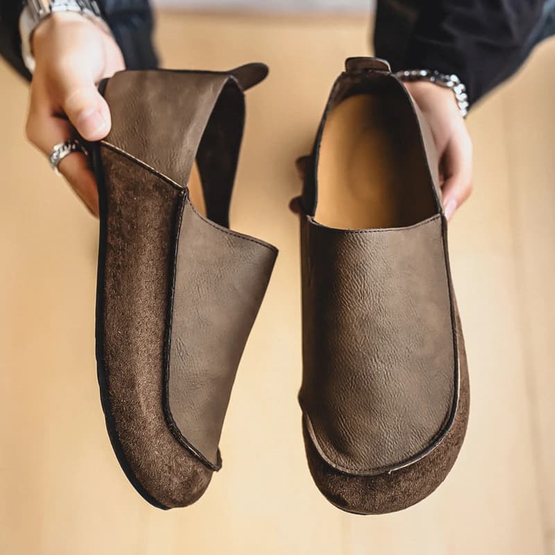 Men's leather-look slip-on loafers in brown, side view